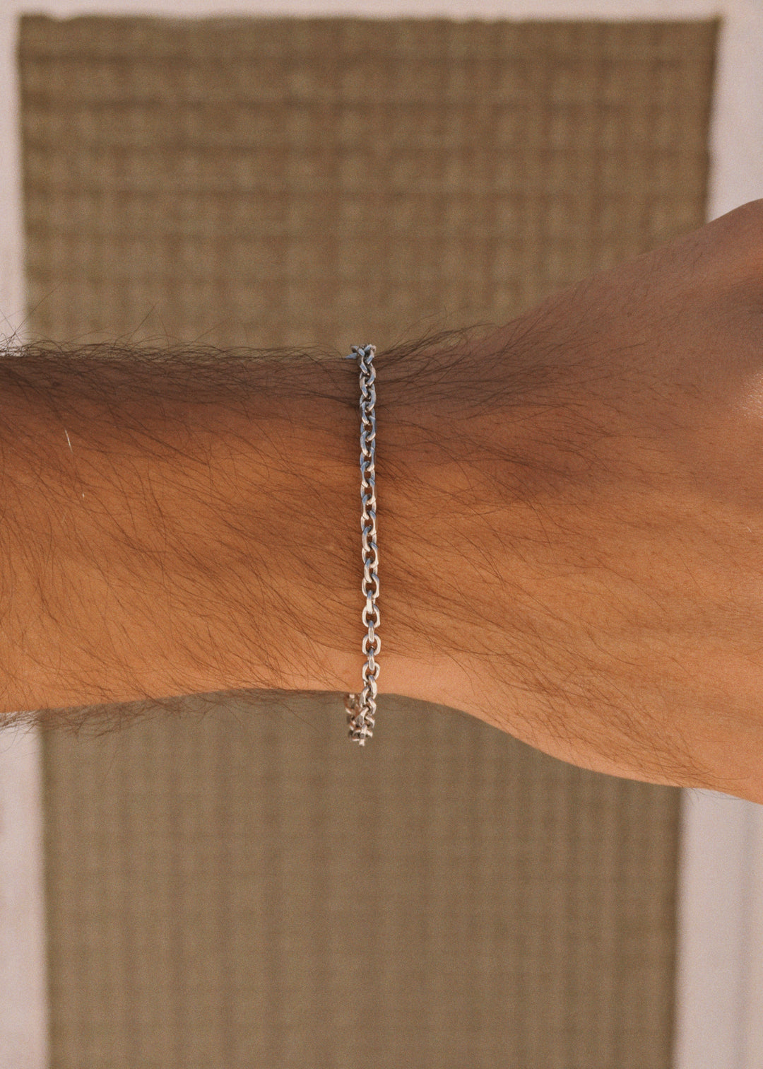 DIVON silver 3mm anchor bracelet worn on wrist – durable, tarnish-free everyday jewelry