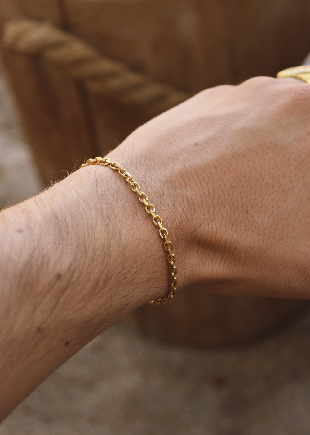 Elegant 3mm gold bracelet worn on wrist – DIVON jewelry styled for daily wear, waterproof and tarnish-free